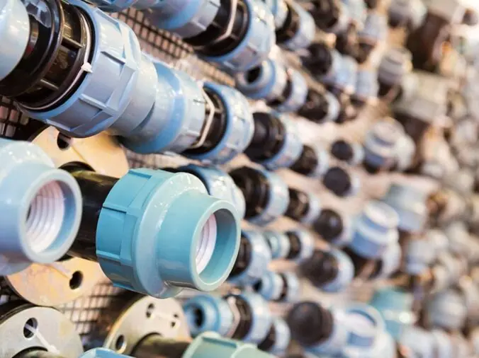 PVC unions on display in a plumning supply wholesaler